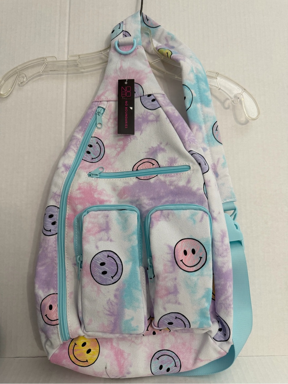 No Boundaries Pastel Tie-Dye Smiley Crossbody Bag with Aqua Accents